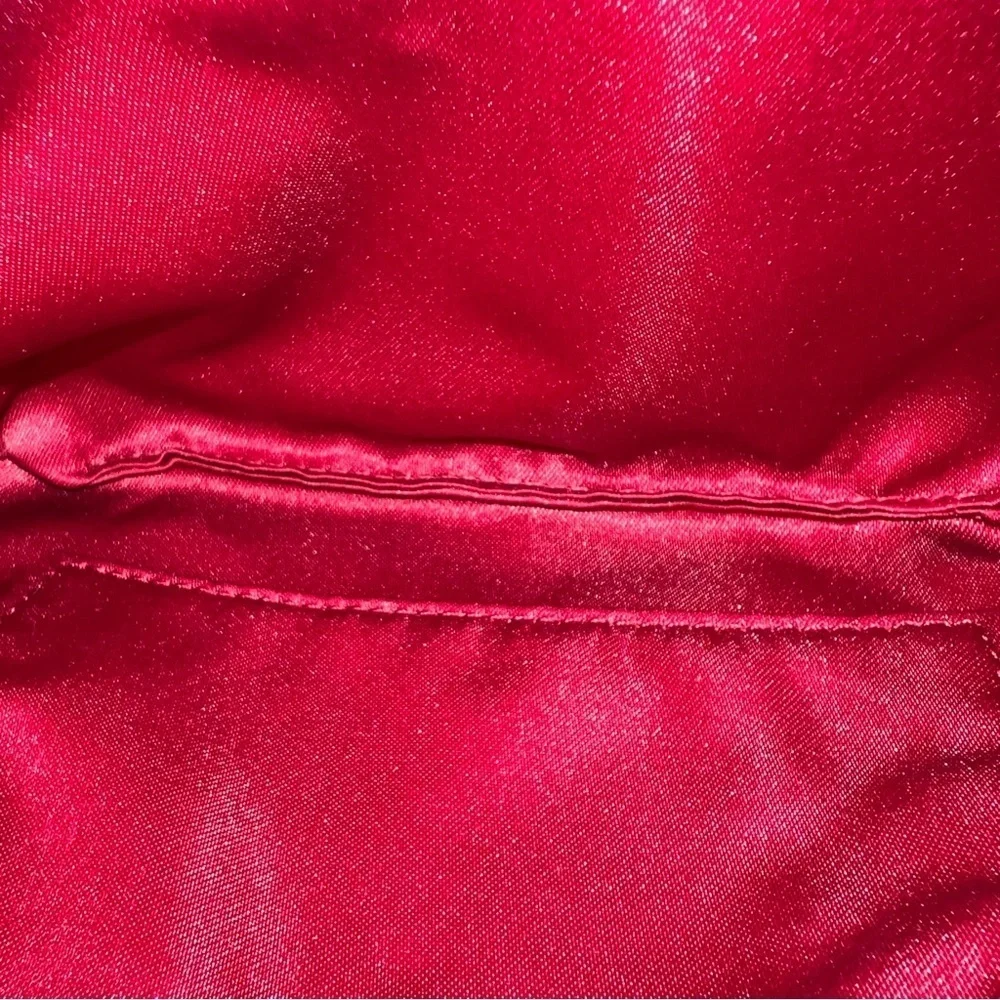 Coach wristlet with pink details! In good condition!